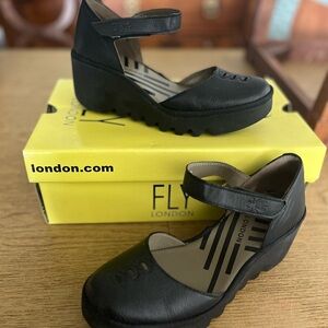 Fly London Black Leather Wedges